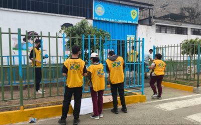Christian volunteers repair school facilities and prepare student garden in Lima, Peru